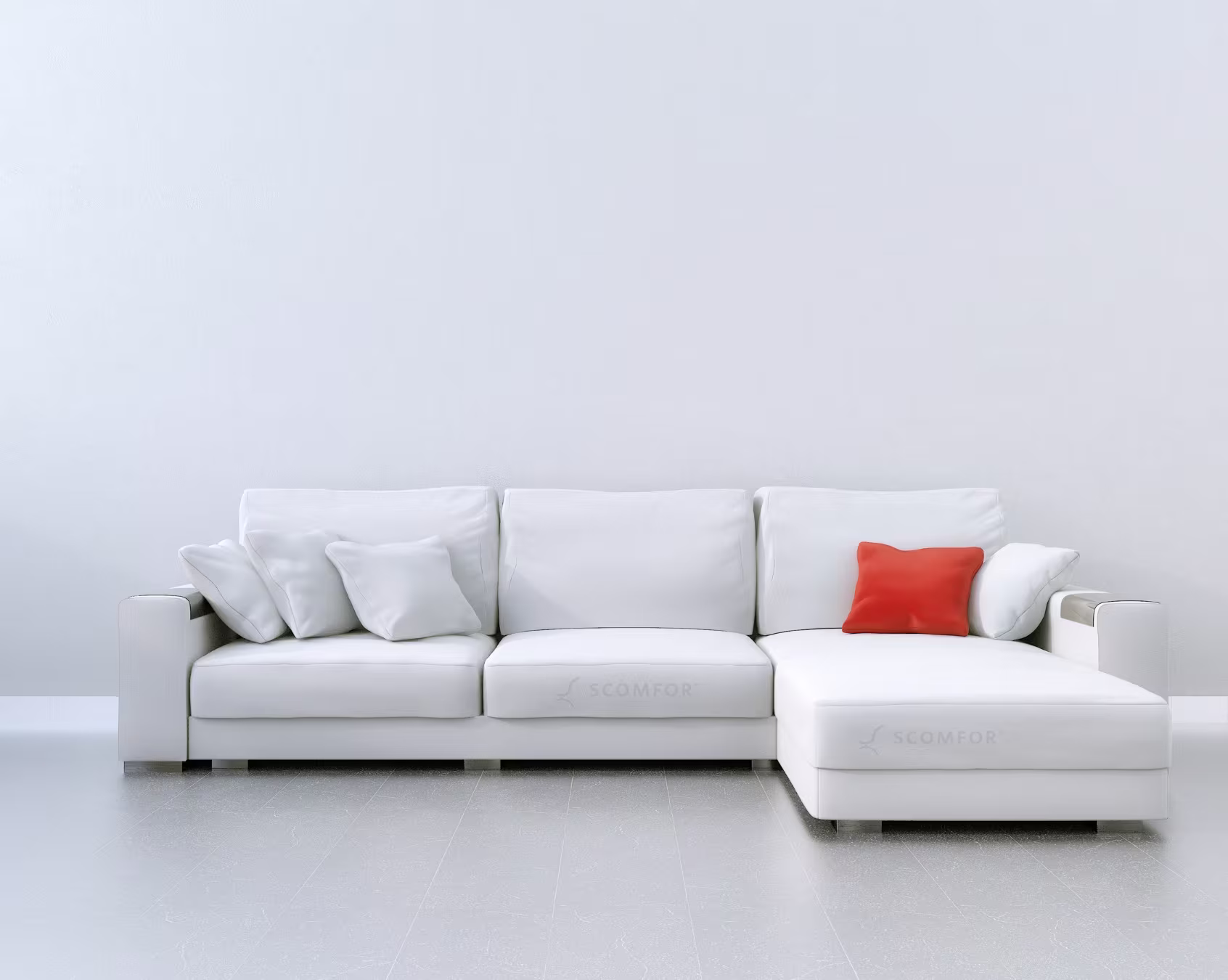 White sectional sofa with orange accent pillow in modern living room