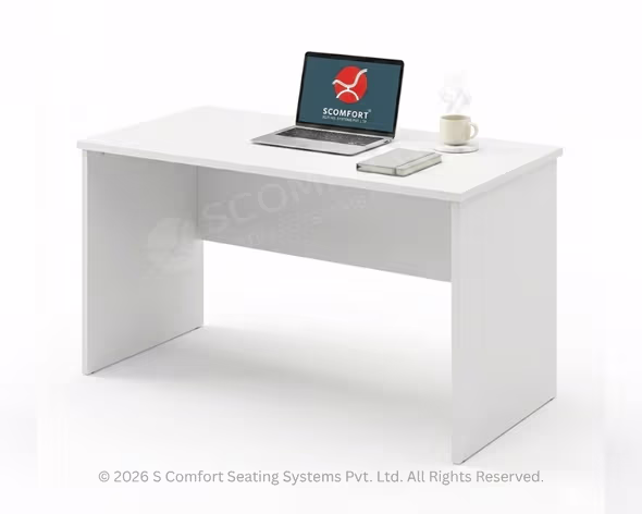 White office computer table with three-drawer mobile storage unit, laptop, and accessories